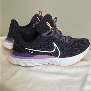 Nike Black and Purple Athletic Shoes with Breathable Knit Upper